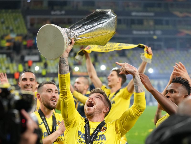 &copy; Reuters. Soccer Football - Europa League Final - Villarreal v Manchester United - Polsat Plus Arena Gdansk, Gdansk, Poland - May 26, 2021 Villarreal's Alberto Moreno celebrates with the trophy after winning the Europa League Pool via REUTERS/Michael Sohn
