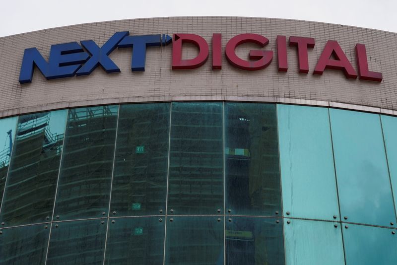 &copy; Reuters. FILE PHOTO: The logo of Next Digital Ltd is seen on the facade of its building in Hong Kong, China May 17, 2021. REUTERS/Lam Yik