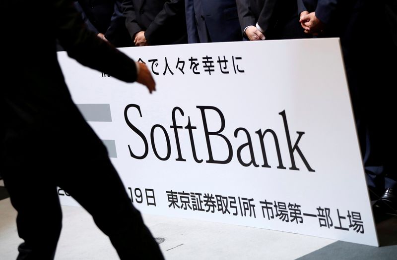 &copy; Reuters. FILE PHOTO: SoftBank Corp. placard is prepared during a ceremony to mark the company's debut on the Tokyo Stock Exchange in Tokyo, Japan December 19, 2018.   REUTERS/Issei Kato