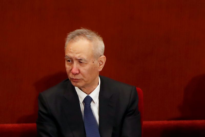 &copy; Reuters. FILE PHOTO: Chinese Vice Premier Liu He attends the opening session of the Chinese People's Political Consultative Conference (CPPCC) at the Great Hall of the People in Beijing, China May 21, 2020. REUTERS/Carlos Garcia Rawlins