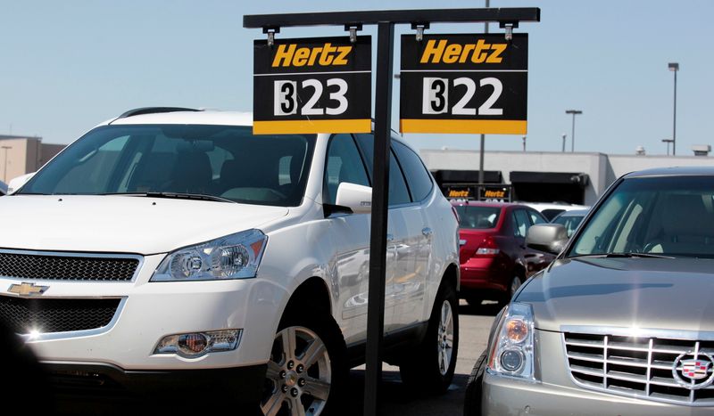 &copy; Reuters. FILE PHOTO: Hertz rental cars are parked in a rental lot near Detroit Metropolitan airport in Romulus, Michigan May 9, 2011. REUTERS/Rebecca Cook