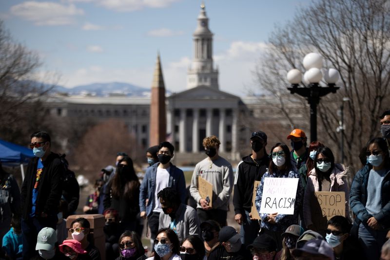 &copy; Reuters. FILE PHOTO: Hundreds gather at the Colorado State Capitol for a rally against anti-Asian hate crimes and to help heal as a community in Denver Colorado, U.S. March 27, 2021.  REUTERS/Alyson McClaran