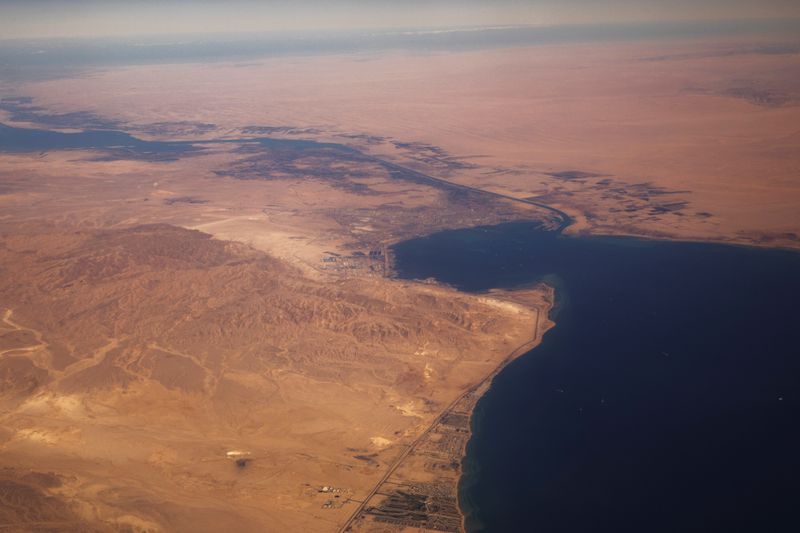 &copy; Reuters. FILE PHOTO: The Suez Canal connecting the Mediterranean Sea to the Red Sea is pictured from the window of a commercial plane flying over Egypt, December 18, 2019. Picture taken December 18, 2019.  REUTERS/Lucas Jackson