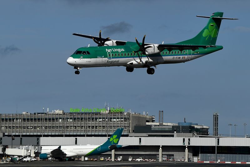 &copy; Reuters. FILE PHOTO: A regional internal Aer Lingus flight on an aircraft called the St. Cronan begins to land at Dublin Airport, in Dublin, Ireland, March 26, 2021. REUTERS/Clodagh Kilcoyne/File Photo