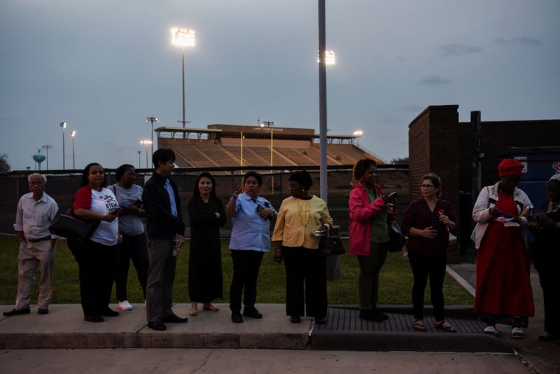 &copy; Reuters. FILE PHOTO: Voters wait in line to cast their ballot in the Democratic primary at a polling station in Houston, Texas, U.S. March 3, 2020.  REUTERS/Callaghan O'Hare/File Photo