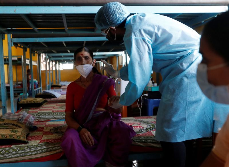 India reports 3,460 more COVID-19 deaths, over 165,000 new infections