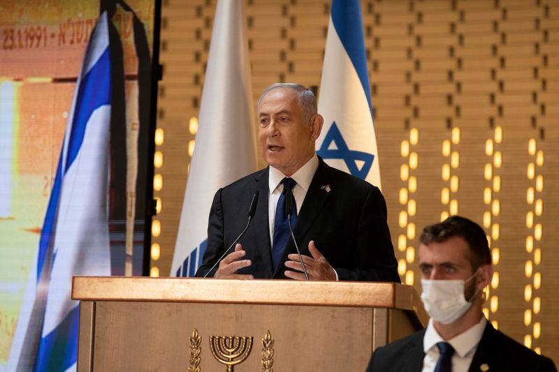 &copy; Reuters. FILE PHOTO: Israeli Prime Minister Benjamin Netanyahu speaks at an official ceremony marking Israel's Memorial Day, which commemorates fallen soldiers and Israeli victims of hostile attacks, at Mount Herzl military cemetery in Jerusalem April 14, 2021. Ma