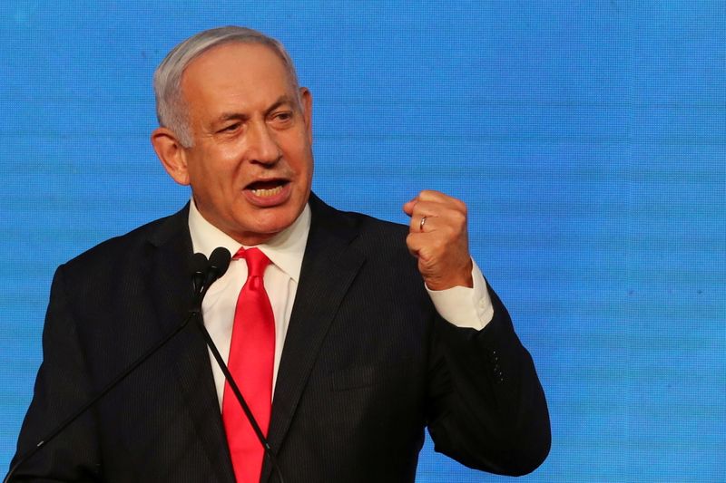 &copy; Reuters. FILE PHOTO: Israeli Prime Minister Benjamin Netanyahu gestures as he delivers a speech to supporters following the announcement of exit polls in Israel's general election at his Likud party headquarters in Jerusalem March 24, 2021. REUTERS/Ammar Awad