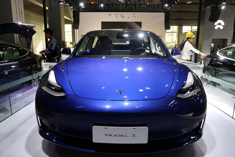 &copy; Reuters. FILE PHOTO: A China-made Tesla Model 3 electric vehicle is seen ahead of the Guangzhou auto show in Guangzhou, Guangdong province, China November 21, 2019. REUTERS/Yilei Sun/File Photo