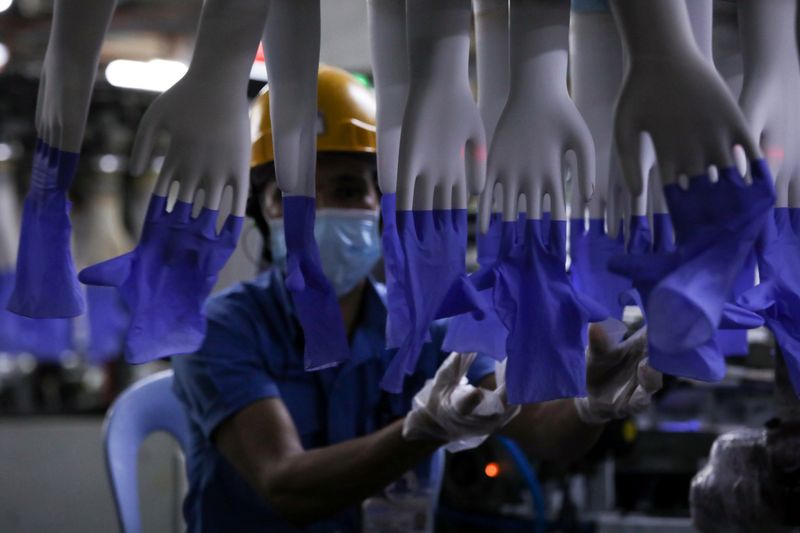 Top Glove's $1 billion Hong Kong listing delayed amid U.S. ban imbroglio - sources