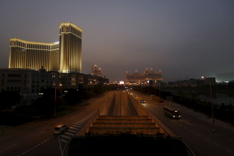 &copy; Reuters. FILE PHOTO: A night view of the Venetian Macao Resort Hotel (L) and Galaxy Macau resort are seen in Macau, China December 31, 2015.  REUTERS/Tyrone Siu