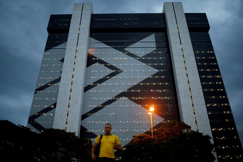 &copy; Reuters. FILE PHOTO: A man walks in front of Banco do Brasil headquarters building  in Brasilia, Brazil October 29, 2019. REUTERS/Adriano Machado