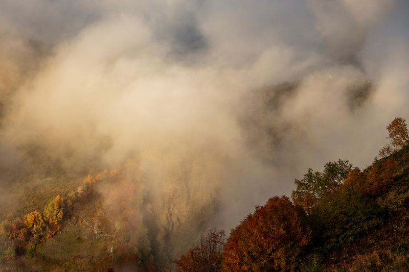 &copy; Reuters. Tiny cabins are seen through clouds during the sunset in the Caucasus mountains outside Krasnaya Polyana near Sochi, Russia September 30, 2019. Picture taken September 30, 2019. REUTERS/Maxim Shemetov