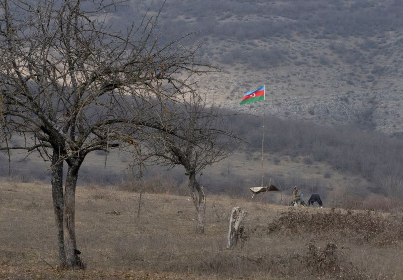 &copy; Reuters. An Azeri soldier is seen at fighting positions near the village of Taghavard in the region of Nagorno-Karabakh, January 18, 2021. Following the military conflict over Nagorno-Karabakh and a further signing of a ceasefire deal, the village was divided int