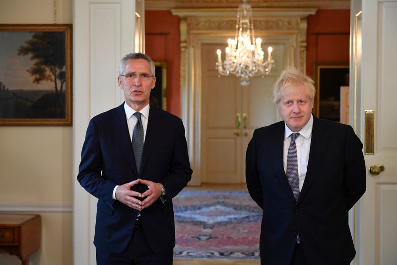 &copy; Reuters. NATO Secretary-General Jens Stoltenberg and Britain's Prime Minister Boris Johnson attend a news conference following their meeting at Downing Street in London, Britain June 2, 2021. Justin Tallis/Pool via REUTERS