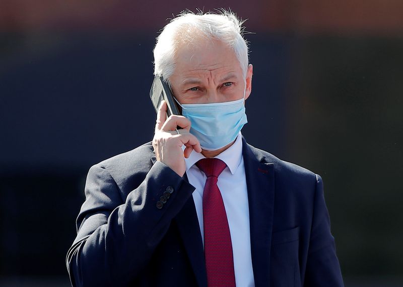 &copy; Reuters. Russia's First Deputy Prime Minister Andrei Belousov wearing a protective face mask talks on the phone before the Victory Day Parade in Red Square in Moscow, Russia June 24, 2020. The military parade, marking the 75th anniversary of the victory over Nazi 