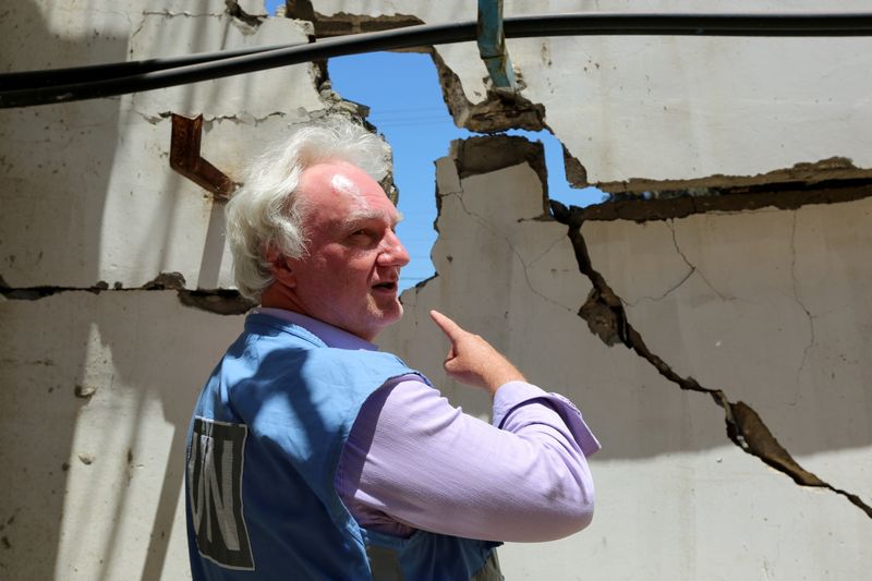 &copy; Reuters. FILE PHOTO: Matthias Schmale, UNRWA's Gaza director, gestures as he inspects the damage at UNRWA'S headquarters, in the aftermath of Israeli air strikes, in Gaza City May 18, 2021. REUTERS/Mohammed Shana