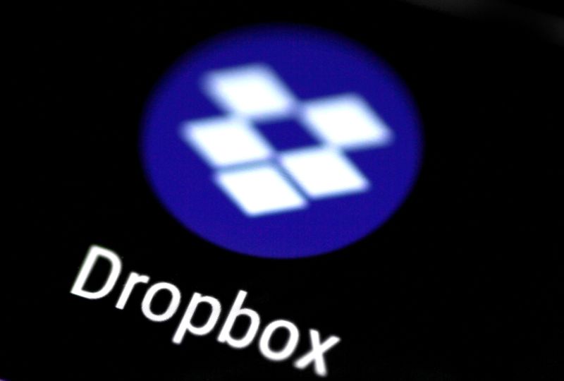 Hedge fund Elliott Management owns big Dropbox stake, holds discussions