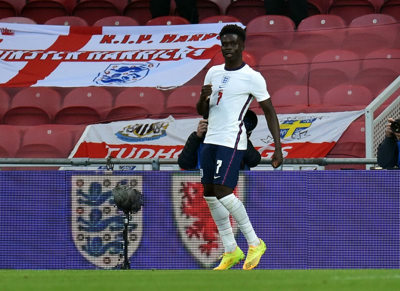 &copy; Reuters. بوكايو ساكا يحتفل بتسجيل أول أهدافه مع منتخب إنجلترا الأول لكرة القدم يوم الأربعاء خلال مباراة ضد النمسا وديا استعدادا لبطولة أوروبا. تصوير