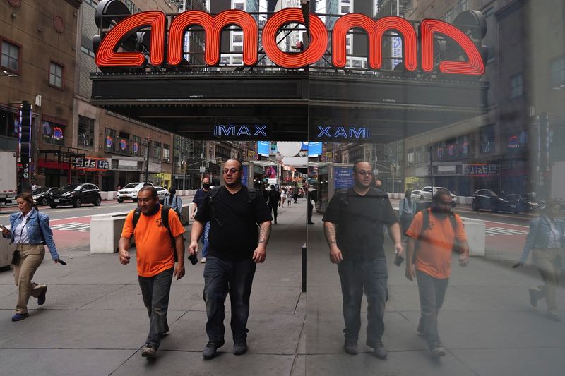 &copy; Reuters. FILE PHOTO: An AMC theatre is pictured in Times Square in the Manhattan borough of New York City, New York, U.S., June 2, 2021.  REUTERS/Carlo Allegri