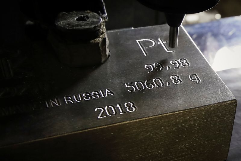 &copy; Reuters. A machine engraves information on an ingot of 99.98 percent pure platinum at the Krastsvetmet non-ferrous metals plant, one of the world's largest producers in the precious metals industry, in the Siberian city of Krasnoyarsk, Russia November 22, 2018. Pi