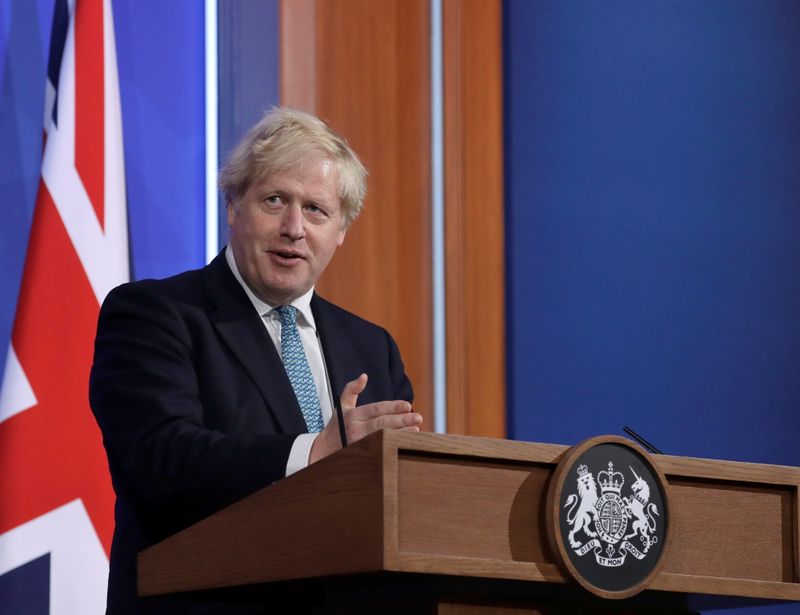 &copy; Reuters. FILE PHOTO: Britain's Prime Minister Boris Johnson speaks at a news conference about the ongoing coronavirus disease (COVID-19) outbreak, in London, Britain May 14, 2021. Matt Dunham/Pool via REUTERS