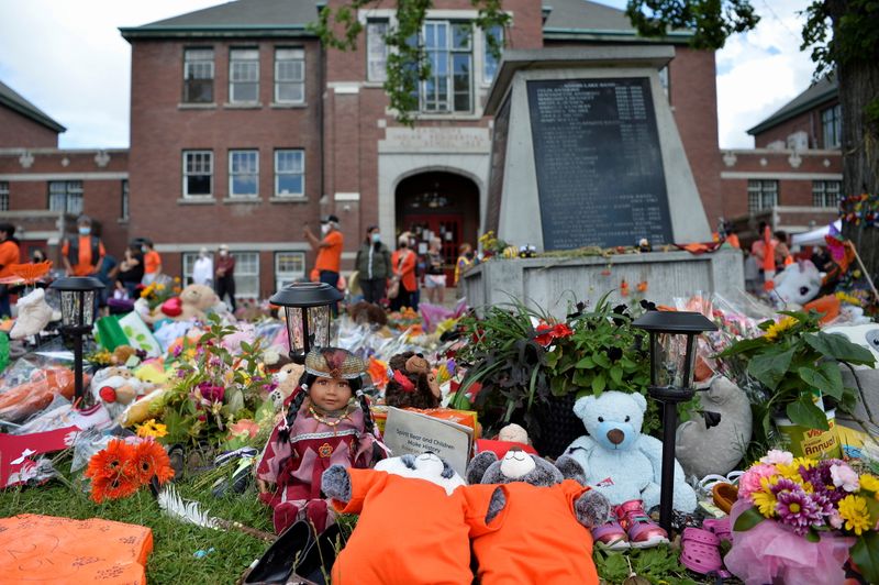 &copy; Reuters. A memorial on the grounds of the former Kamloops Indian Residential School is seen after the remains of 215 children, some as young as three years old, were found at the site in Kamloops, British Columbia, Canada June 5, 2021.  REUTERS/Jennifer Gauthier  