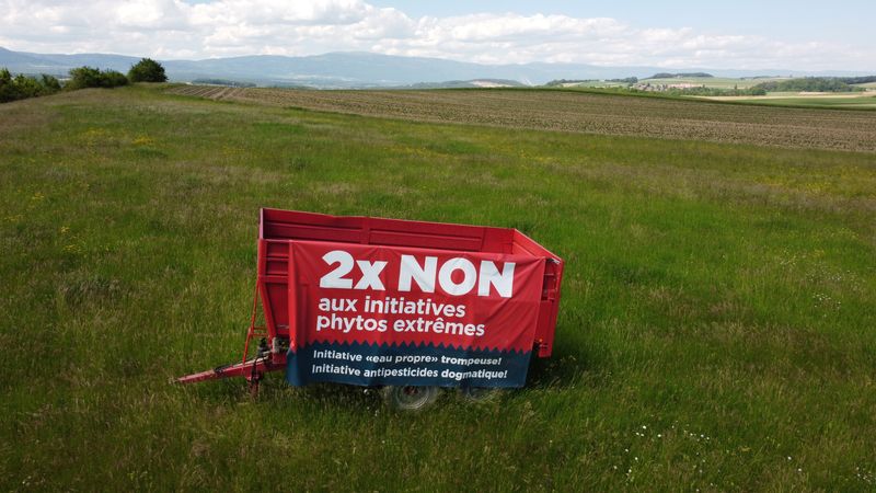 &copy; Reuters. FILE PHOTO:  A sign to vote "no" is pictured ahead of a Swiss vote on June 13 on two popular initiatives to curb the use of pesticides in agriculture, in Penthaz, Switzerland, May 31, 2021. REUTERS/Denis Balibouse/File photo