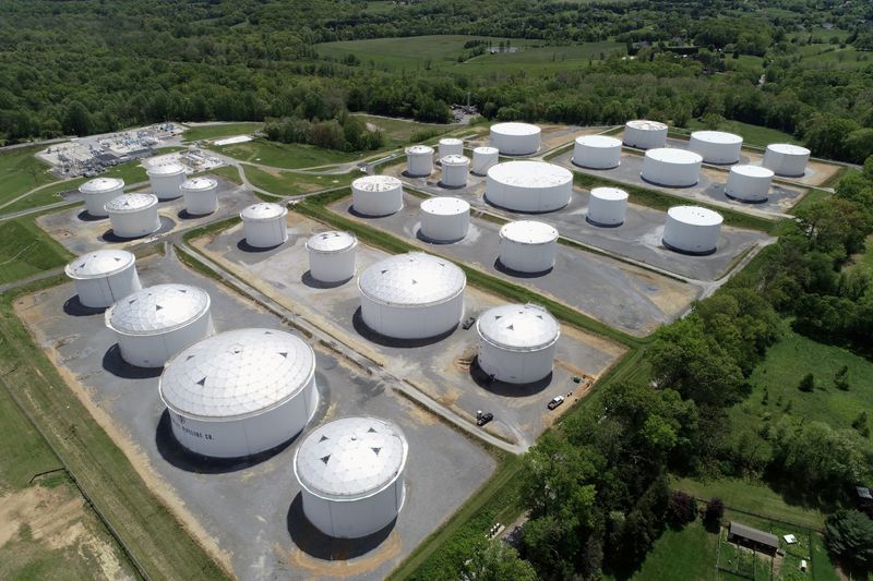 &copy; Reuters. FILE PHOTO: Holding tanks are seen in an aerial photograph at Colonial Pipeline's Dorsey Junction Station in Woodbine, Maryland, U.S. May 10, 2021. REUTERS/Drone Base