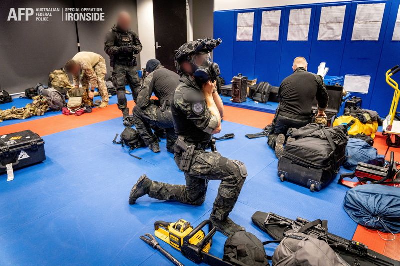&copy; Reuters. Australian Federal Police are seen during its Operation Ironside against organised crime in this undated handout photo released June 8, 2021.   Australian Federal Police/Handout via REUTERS   
