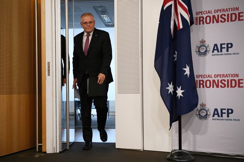 &copy; Reuters. رئيس الوزراء الأسترالي سكوت موريسون لدى وصوله لمؤتمر صحفي في سيدني يوم الثلاثاء. صورة لرويترز. يحظر إعادة بيع الصورة أو الاحتفاظ بها في أرشي
