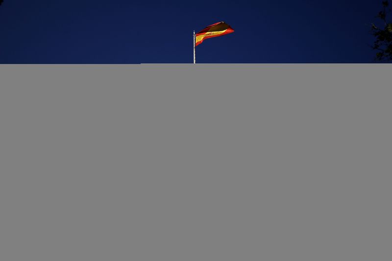 &copy; Reuters. A Spanish flag flutters above the Madrid Stock Exchange, Spain, June 1, 2016. REUTERS/Juan Medina