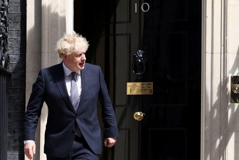 &copy; Reuters. FILE PHOTO: British Prime Minister Boris Johnson walks outside 10 Downing Street to meet NATO Secretary-General Jens Stoltenberg in London, Britain, June 2, 2021. REUTERS/Henry Nicholls