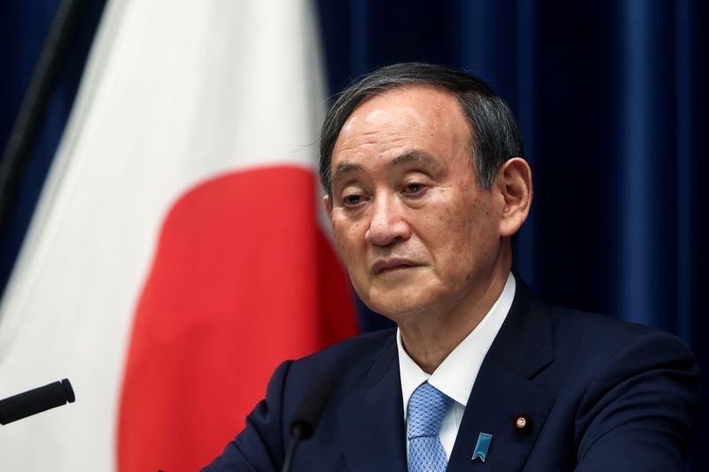 &copy; Reuters. FILE PHOTO: Japan's Prime Minister Yoshihide Suga speaks during a news conference after the government's decision to exted a state of emergency amid coronavirus disease (COVID-19) pandemic, at the prime minister's official residence in Tokyo, Japan May 28