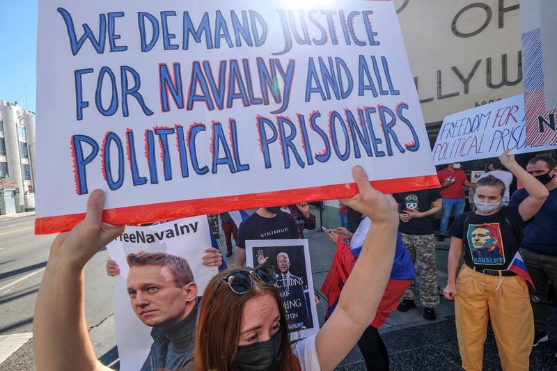 &copy; Reuters. Protesters march in Hollywood during a demonstration in support of Russian opposition leader Alexei Navalny, who was sentenced to jail, in Los Angeles, California, U.S. February 6, 2021.  REUTERS/Ringo Chiu