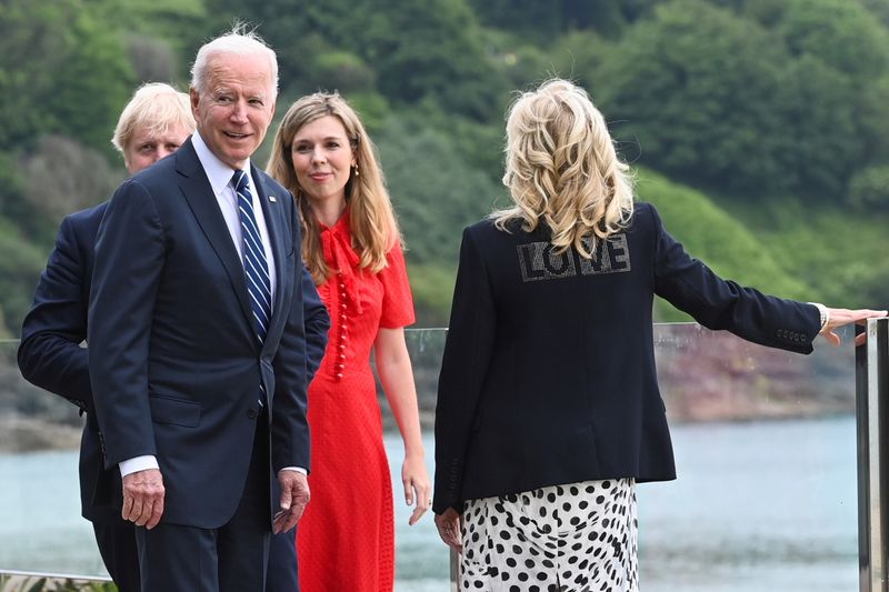 &copy; Reuters. U.S. first lady Jill Biden wearing a jacket with the phrase "Love" stands next to U.S. President Joe Biden, Britain's Prime Minister Boris Johnson and his wife Carrie Johnson, during their meeting, at Carbis Bay, Cornwall, Britain June 10, 2021. REUTERS/T
