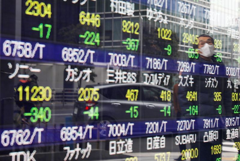 European shares hit record high, bond yields fall as inflation fears ease
