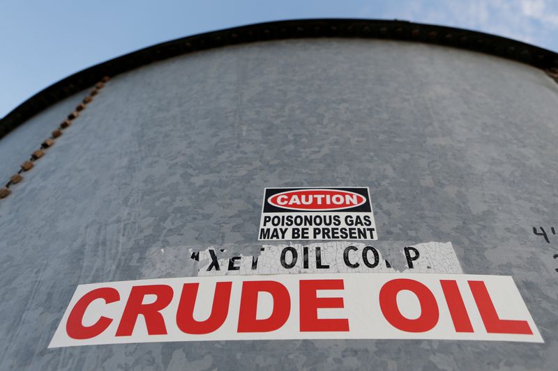 &copy; Reuters. FILE PHOTO: A sticker reads crude oil on the side of a storage tank in the Permian Basin in Mentone, Loving County, Texas, U.S. November 22, 2019. Picture taken November 22, 2019.   REUTERS/Angus Mordant/File Photo