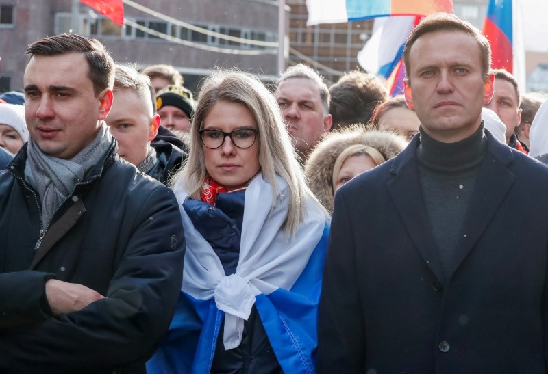 &copy; Reuters. FILE PHOTO: Russian opposition politicians Alexei Navalny, Lyubov Sobol and Ivan Zhdanov take part in a rally to mark the 5th anniversary of opposition politician Boris Nemtsov's murder and to protest against proposed amendments to the country's constitut