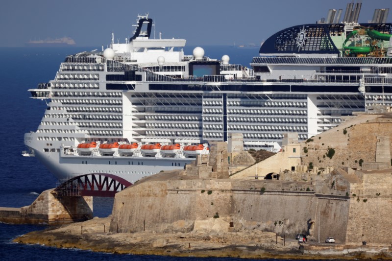 © Reuters. The cruise liner MSC Grandiosa towers over Fort Saint Elmo, built in the 16th century, as it departs from Grand Harbour in Valletta, Malta June 10, 2021.  REUTERS/Darrin Zammit Lupi