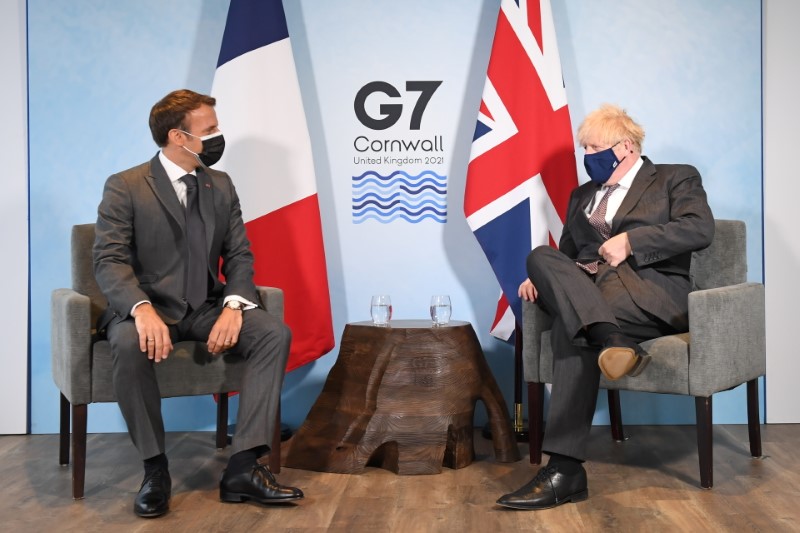&copy; Reuters. Britain's Prime Minister Boris Johnson and France's President Emmanuel Macron attend a bilateral meeting during G7 summit in Carbis Bay, Cornwall, Britain, June 12, 2021. Stefan Rousseau/Pool via REUTERS