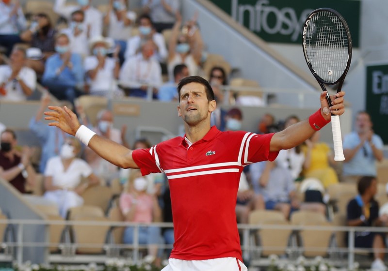 &copy; Reuters. Tennis - French Open - Roland Garros, Paris, France - June 13, 2021 Serbia's Novak Djokovic reacts during the final against Greece's Stefanos Tsitsipas REUTERS/Gonzalo Fuentes