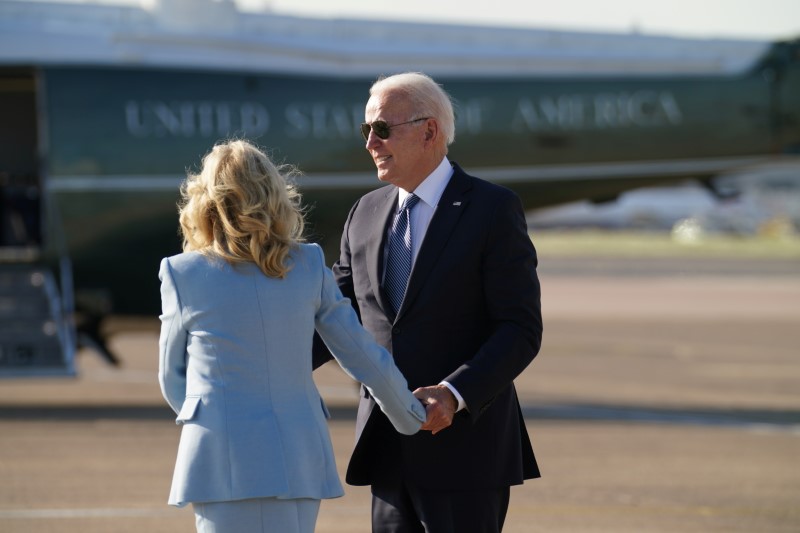&copy; Reuters. U.S. President Joe Biden and first lady Jill Biden hold hands before he departs Heathrow Airport on his way to Belgium, in London, Britain, June 13, 2021. REUTERS/Kevin Lamarque