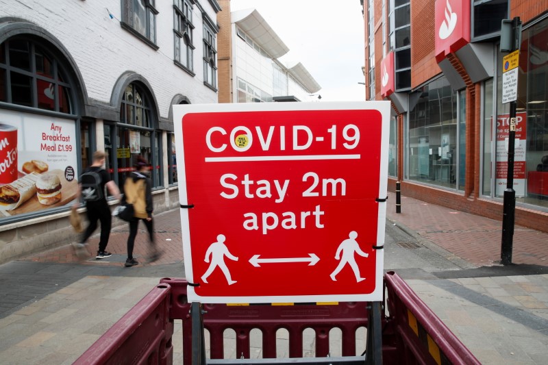 &copy; Reuters. FILE PHOTO: A social distancing sign is seen amid the spread of the coronavirus disease (COVID-19), in Leicester, Britain, May 27, 2021. REUTERS/Andrew Boyers