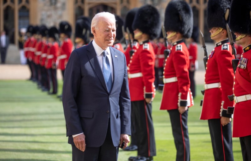 &copy; Reuters. U.S. President Joe Biden inspects a Guard of Honour after arriving to meet Britain's Queen Elizabeth at Windsor Castle, in Windsor, Britain, June 13, 2021. Richard Pohle/Pool via REUTERS