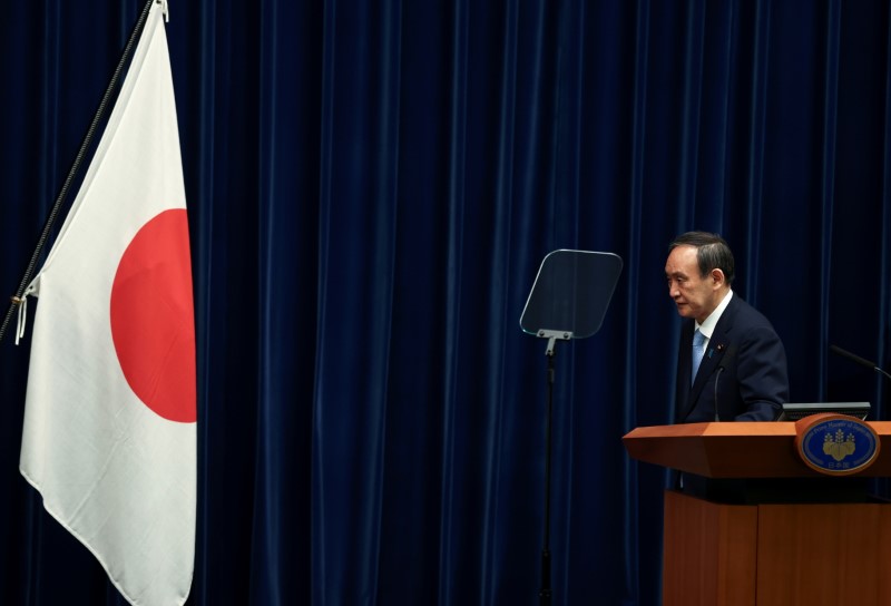 &copy; Reuters. Primeiro-ministro do Japão, Yoshihide Suga, durante entrevista coletiva em Tóquio
28/05/2021 Behrouz Mehri/Pool via REUTERS