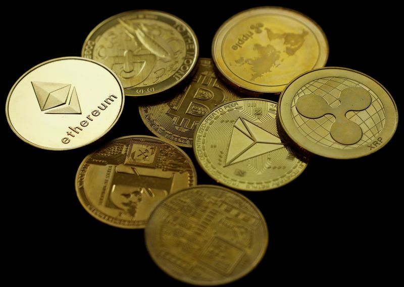 &copy; Reuters. FILE PHOTO: A representation of the virtual cryptocurrency Ethereum is seen among representations of other cryptocurrencies in this picture illustration taken June 14, 2021. REUTERS/Edgar Su/Illustration