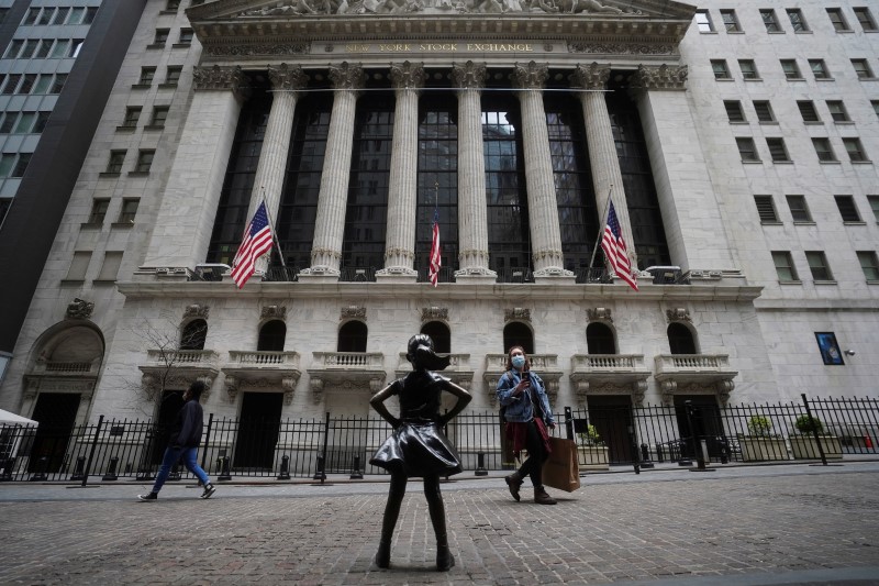 Wall Street ends down as data spooks investors awaiting Fed report