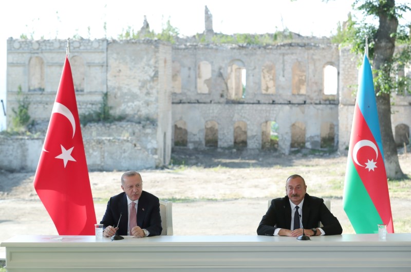 &copy; Reuters. Turkey's President Tayyip Erdogan and Azerbaijan's President Ilham Aliyev attend a signing ceremony in Shusha in Nagorno-Karabakh region, Azerbaijan June 15, 2021. Presidential Press Office/Handout via REUTERS ATTENTION EDITORS - THIS PICTURE WAS PROVIDED