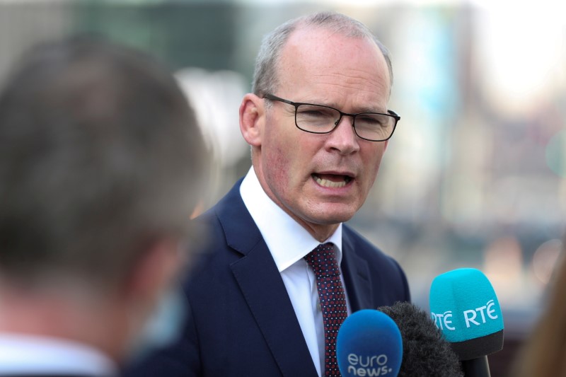 &copy; Reuters. FILE PHOTO: Irish Foreign Minister Simon Coveney, speaks to the media after a European general affairs ministers council, in Brussels, Belgium September 22, 2020. REUTERS/Yves Herman